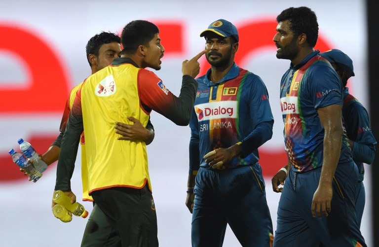 Bangladesh’s Nurul Hasan, while bringing drinks on the field too had a heated exchange of words with Sri Lankan skipper Thisara Perera.
