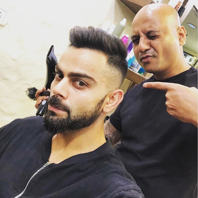Now Virat has posted an image on social media revealing his latest hairdo done by famous hairstylist Aalim Hakim.